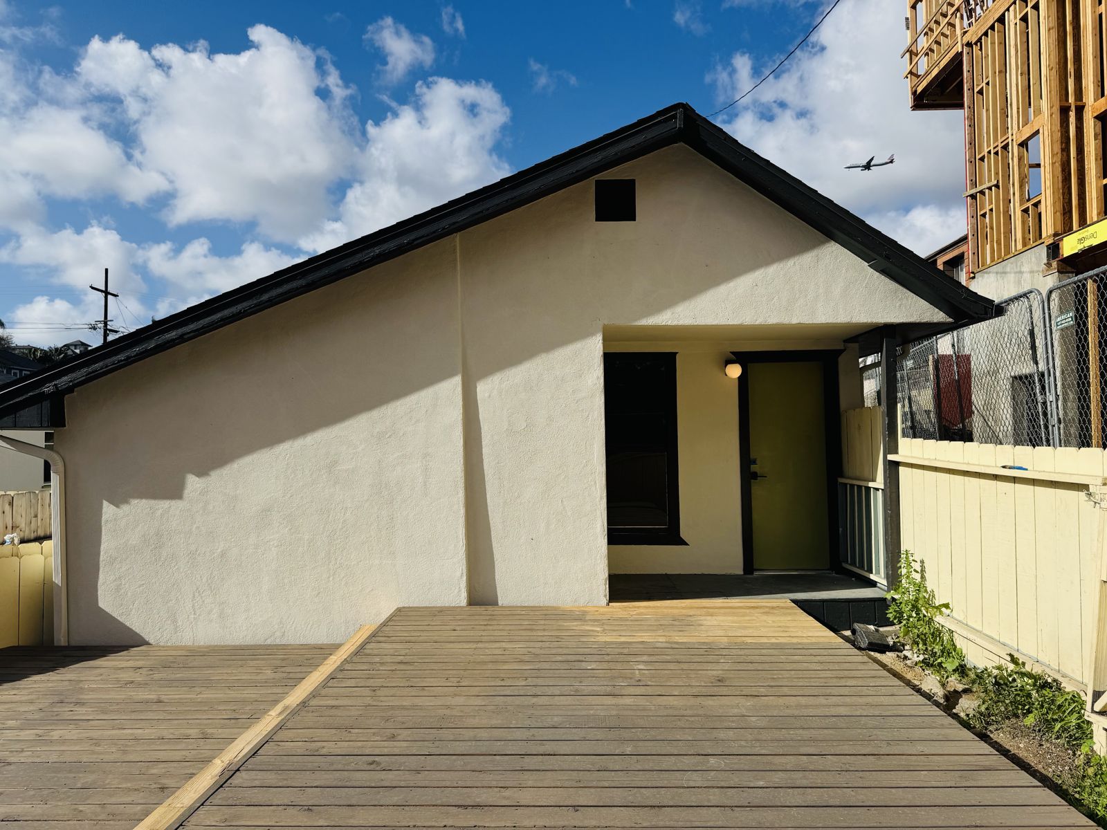 Large wood deck in front of the house
